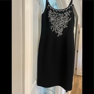 Fabulous black spaghetti strap dress w/ white floral embroidered motif!